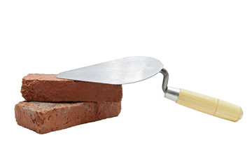 construction lute trowel with red brick