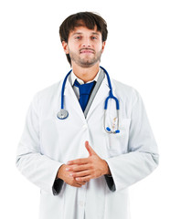 Fototapeta premium Young doctor isolated on white