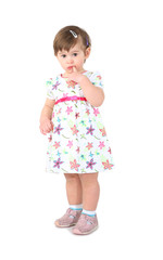 little girl in a light summer dress.