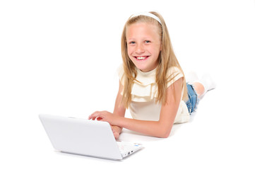Happy little girl with laptop