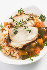 Roasted pork meat with rice and vegetables