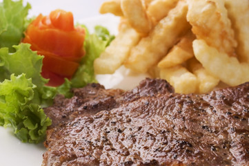 Steak, salad and french fries