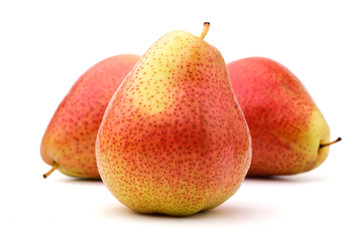 Three pears, arranged in a row, isolated, white background