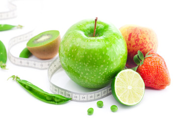 big juicy red ripe strawberries,apple,lime,peas,peach,kiwi  and
