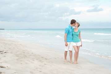 Fototapeta na wymiar Happy couple on the beach