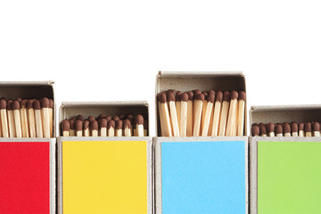 Fototapeta premium Motley Matchboxes On White