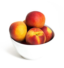 bowl with juicy peaches