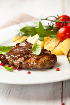 Grilled steak with grilled vegetables