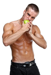 Muscle sexy wet naked young man eating the green apple