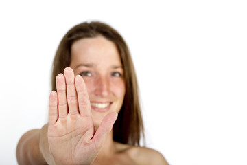 Lovely girl holding up hand