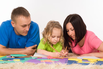 Fototapeta premium family on the carpet