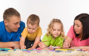 Fototapeta premium family on the carpet