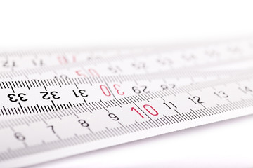 white folding rule over white Backgroun