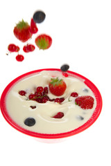 Fresh yogurt with falling fruit