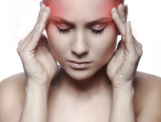 woman with headache on white background