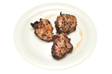 grilled lamb pieces on a plate