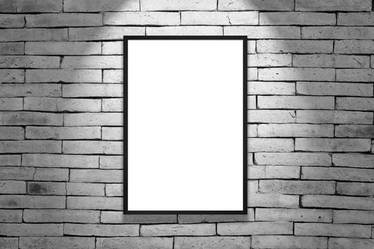 One Black Frame On Gray Brick Wall