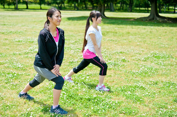 beautiful asian women exercising in the park
