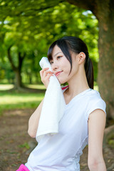 Fototapeta premium beautiful asian woman relaxing in the park