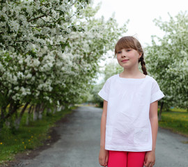 Fototapeta premium little girl in spring park
