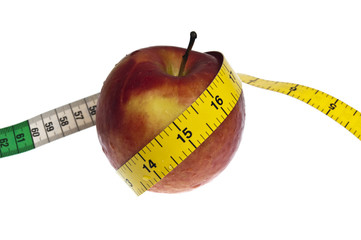 Measurement tape and apple