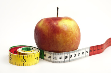 Measurement tape and apple