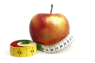 Measurement tape and apple