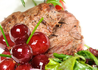 grilled meat with grapes