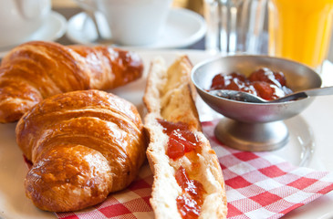 fresh croissant with orange juice