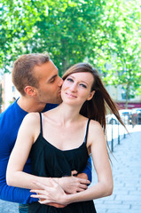 Portrait of Young kissing couple