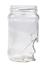 Empty broken glass jar isolated over white background.