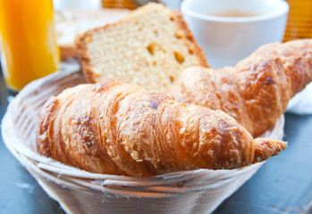 fresh croissant with orange juice