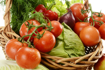 Composition with raw vegetables and wicker basket