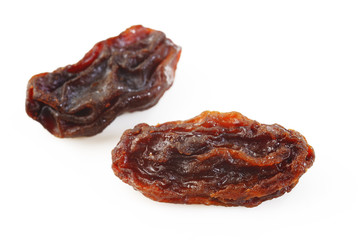 Raisins on white background
