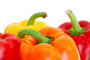 Close-up of bell peppers on white background
