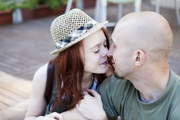 Happy Portrait of Young kissing couple