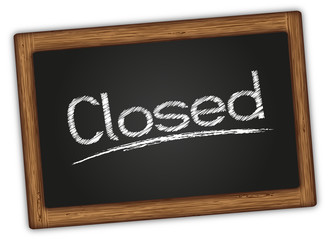 Blackboard with the words vector Closed