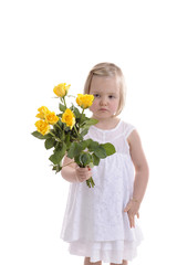 sad looking little girl with bouquet of yellow roses