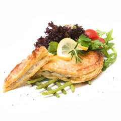 Codfish and puff pastry with fresh salad