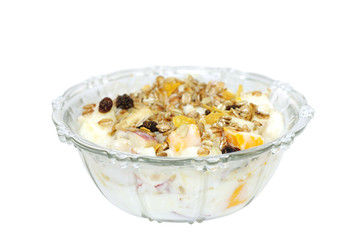 Fresh fruits with yogurt and muesli at shallow DOF