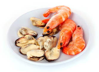 close up of fresh boiled mussels and shrimps isolated on white b