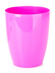 Pink empty plastic flower pot isolated on white background © Africa Studio