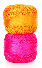 Two thread bobbins isolated on white