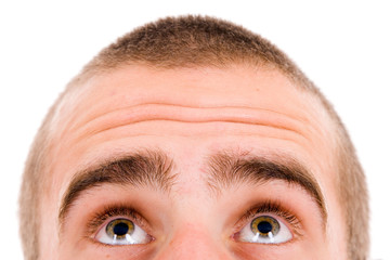 Close-up of Young man looking up