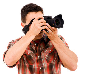 Young photographer with camera, isolated on white