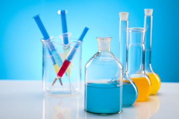 Laboratory glassware containing colorful liquid