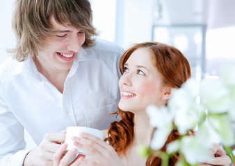 young couple with a gift