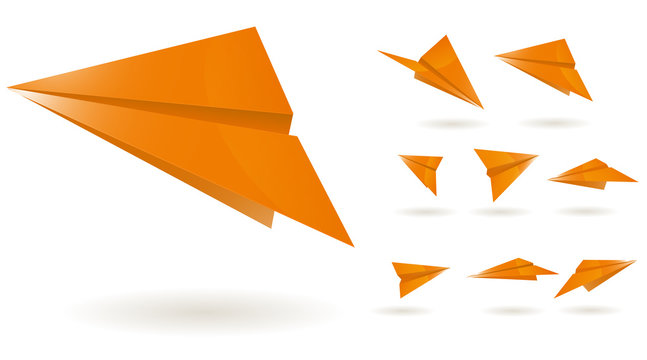 orange paper planes isolated on white background