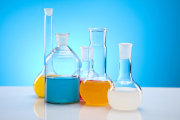 Laboratory glassware containing colorful liquid