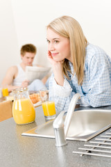 Obraz na płótnie Canvas Breakfast happy couple drink orange juice morning